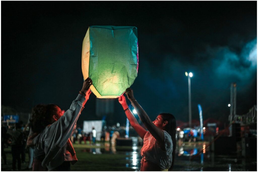 Part Glastonbury, Part Davos, All Attention balloons, darling, night, clouds, festival, people, nature, love