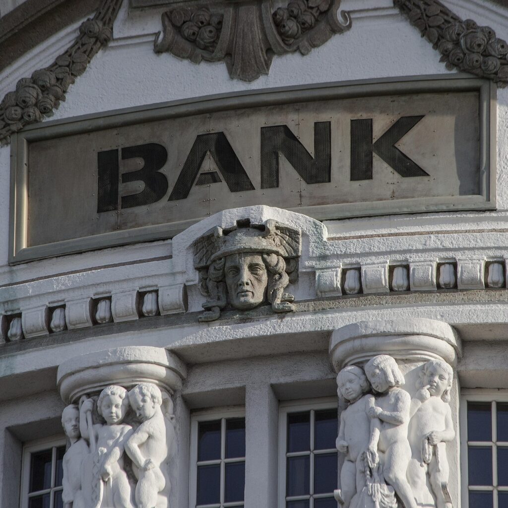 The 140-Company Stablecoin: Why Visa, Mastercard and BlackRock Just Ganged Up bank, money, shares, save up, capital, financing, banking crisis, credit, banks house, building, architecture, rent, bank building, facade, stone relief, columns, sculptures, historical, monument, stone figure, classical, artful