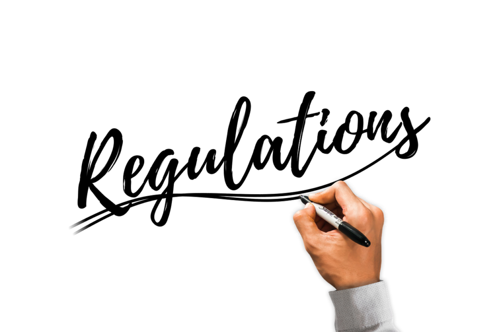 What UK Crypto Regulation Means for Your Money hand, write, regulations, provisions, regulation, regulations, regulations, regulations, regulations, regulations, regulation, regulation, regulation