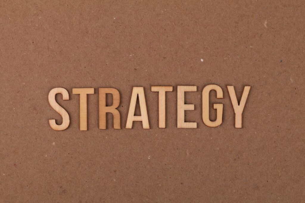 Strategy Bitcoin Buyback: What the $2 Billion Plan Means for BTC Wooden letters spelling 'Strategy' on a cardboard background, perfect for business concepts.