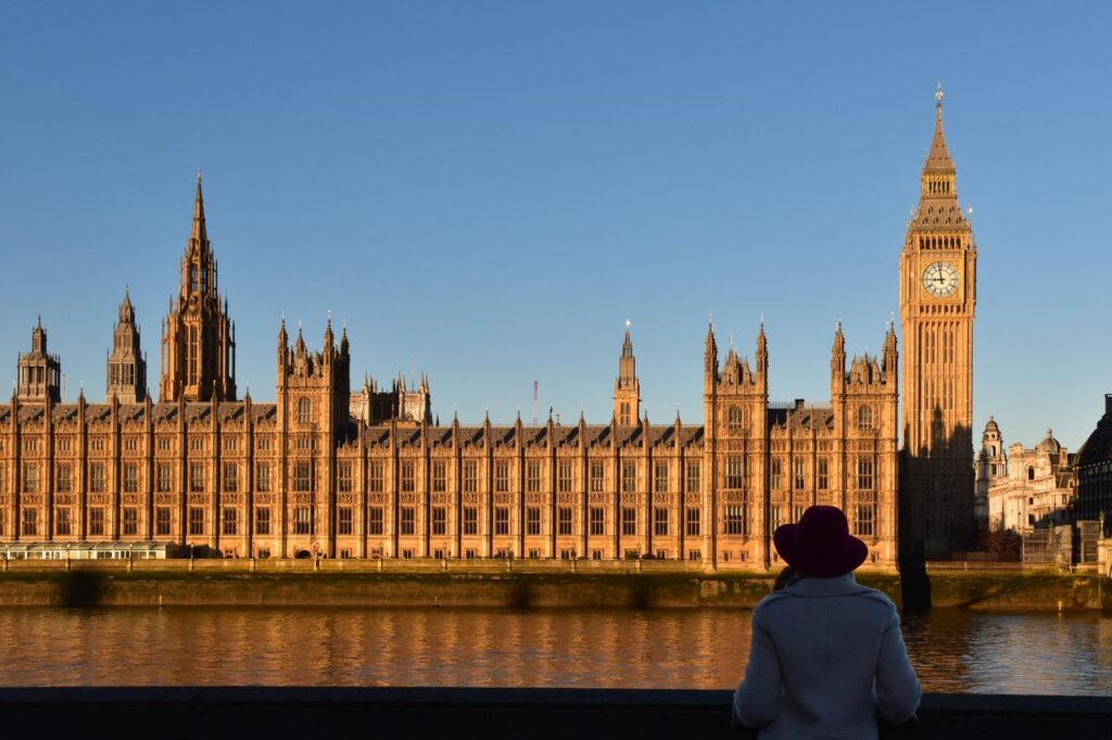 Keir Starmer Resigns: The Market Waits to See What Comes Next A silhouette of a person enjoying the sunset view of Big Ben and the Houses of Parliament in London, UK.