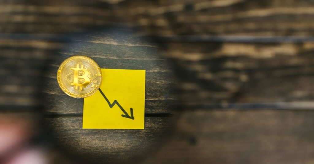 Crypto's $890 Billion Question: Where Did All the Money Go? A gold Bitcoin and downward trend arrow symbolizing cryptocurrency market decline.