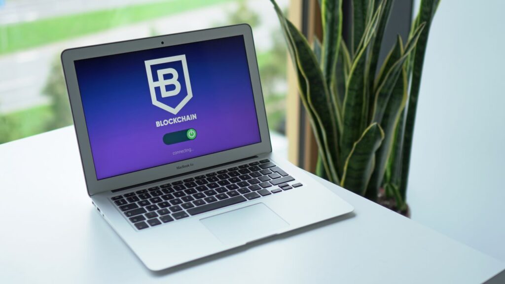 How The Money Actually Moves A modern laptop on a desk showing a blockchain interface, ideal for cryptocurrency topics.