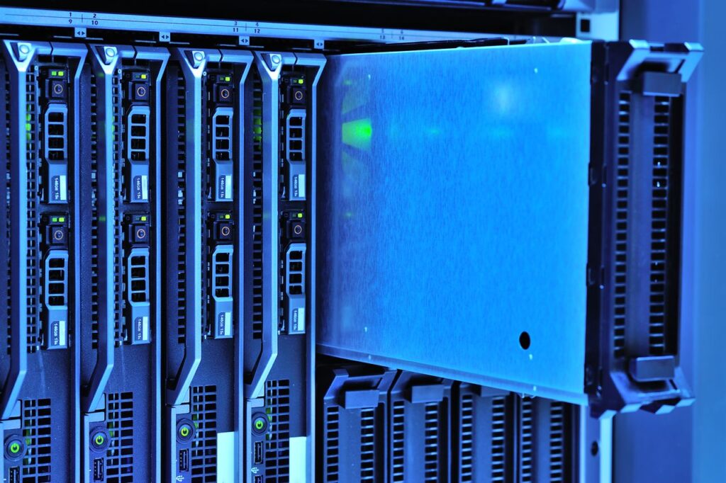 The Miners Who Became Something Else Detailed view of server racks with glowing lights in a data center environment.