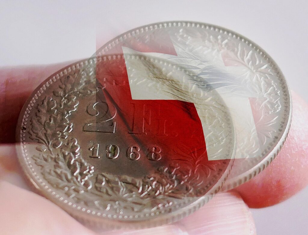 Switzerland Held at Zero and Looked Relieved currency, switzerland, swiss francs, swiss franc, money, finance, coins, cash, hard money, metal, saved, savings, save up, glittering, swiss, metal money, loose change, swiss francs, swiss francs, swiss franc, swiss franc, swiss franc, swiss franc, swiss franc