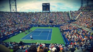 News Thrilling tennis match at the US Open with a full stadium of enthusiastic fans.