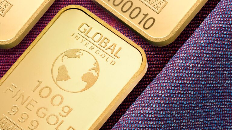 Close-up image of high-quality gold bars, symbolizing wealth and investment potential.